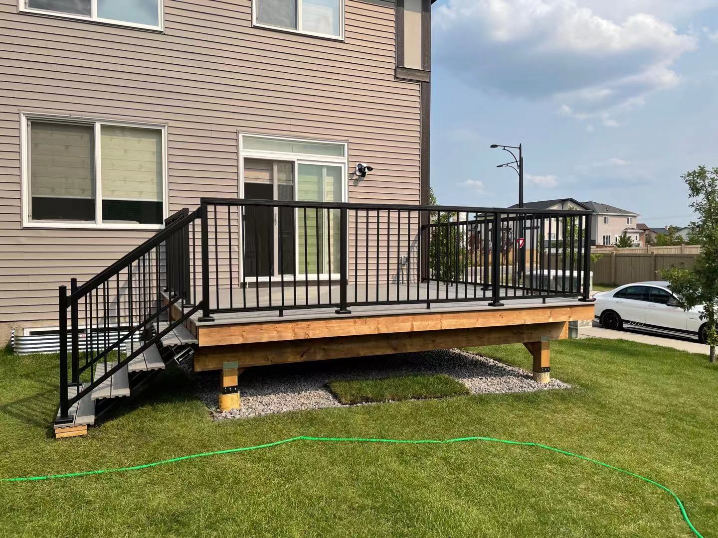a newly constructed wood fence in the backyard