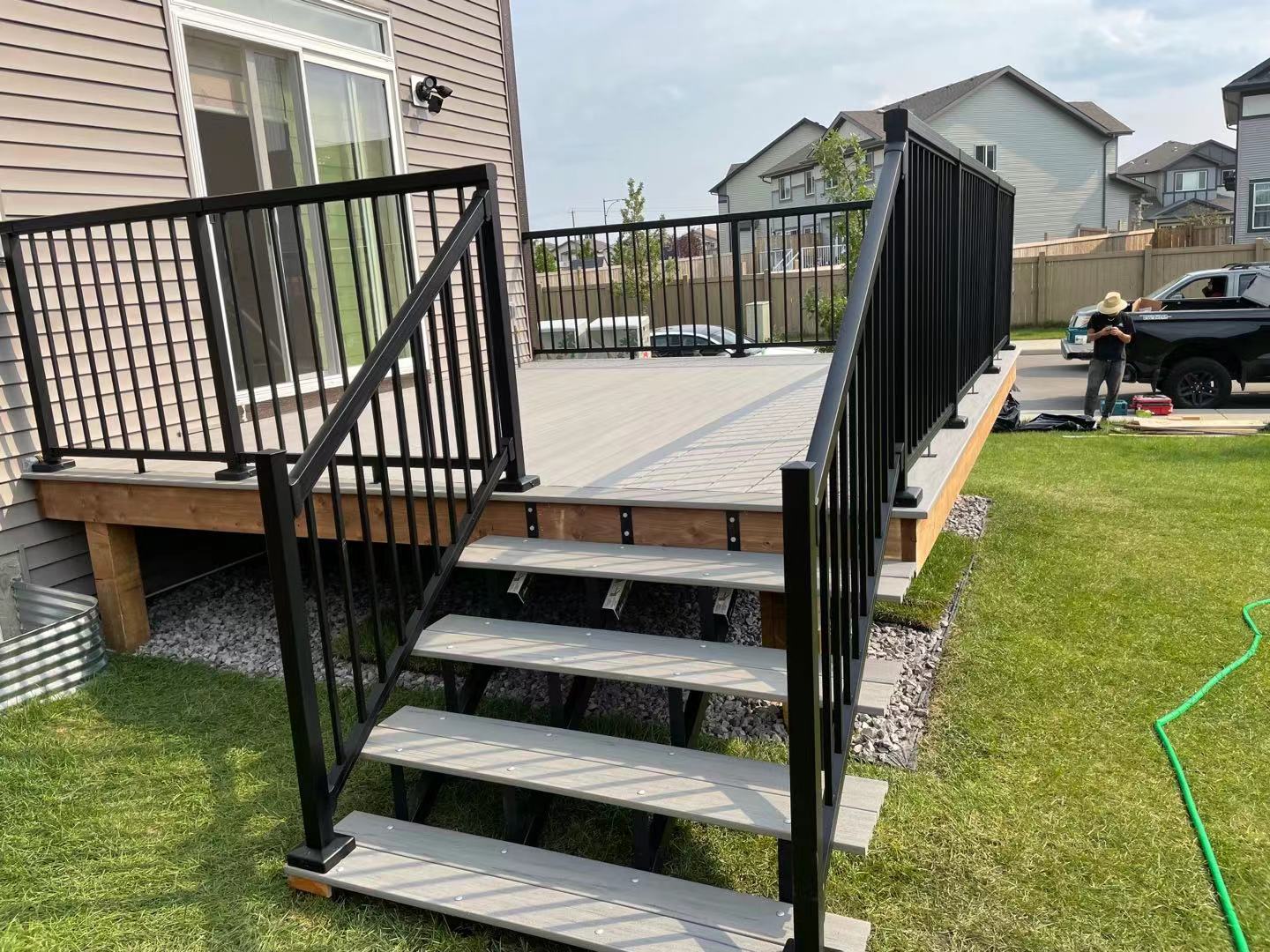 a newly constructed wood fence in the backyard