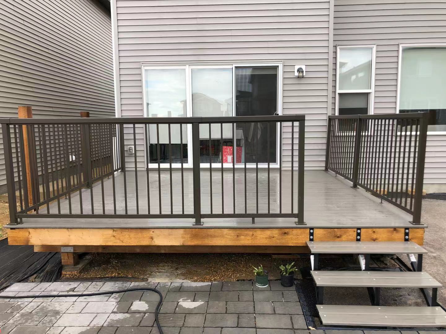 a newly constructed wood fence in the backyard