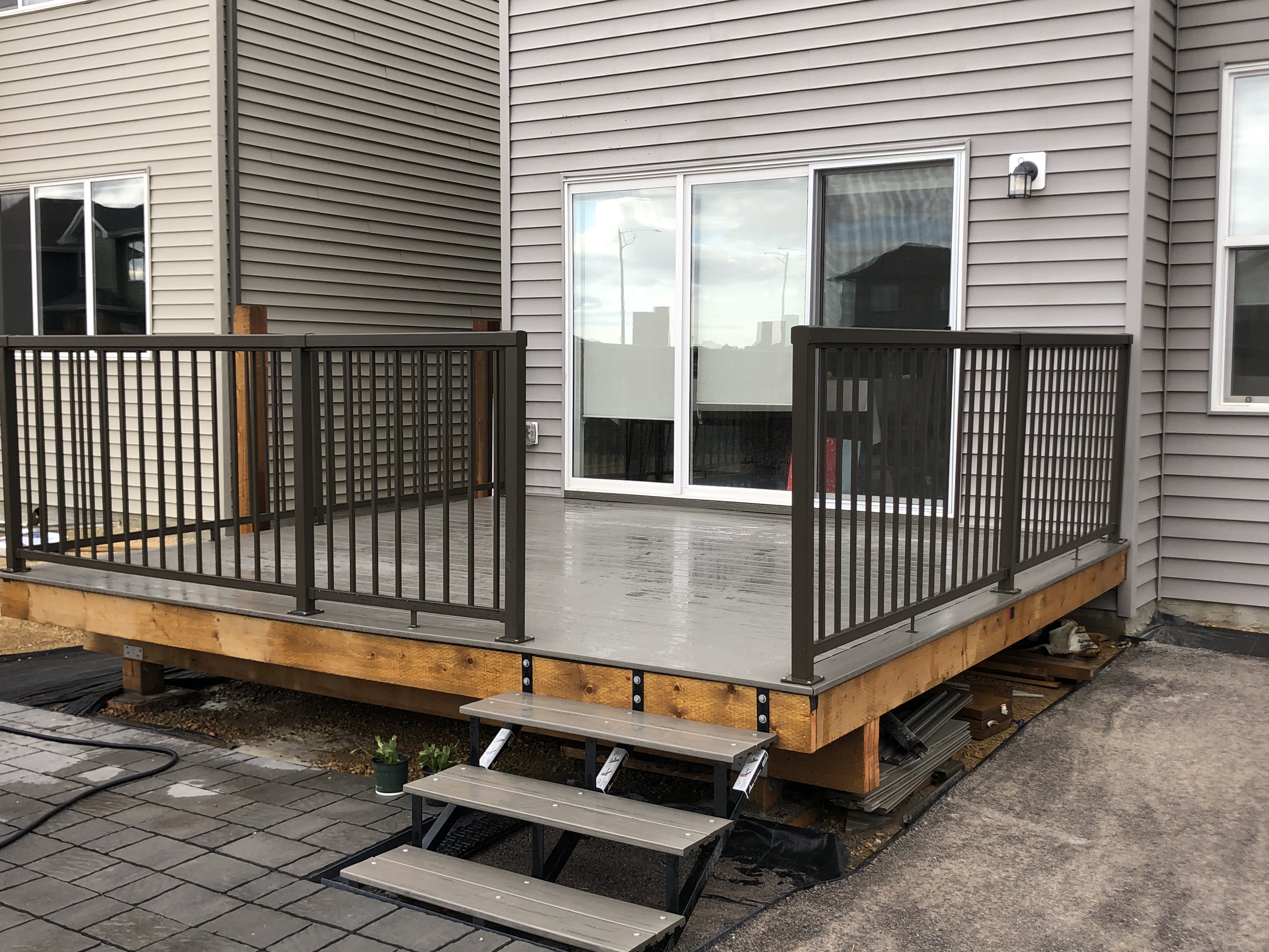 a newly constructed wood fence in the backyard